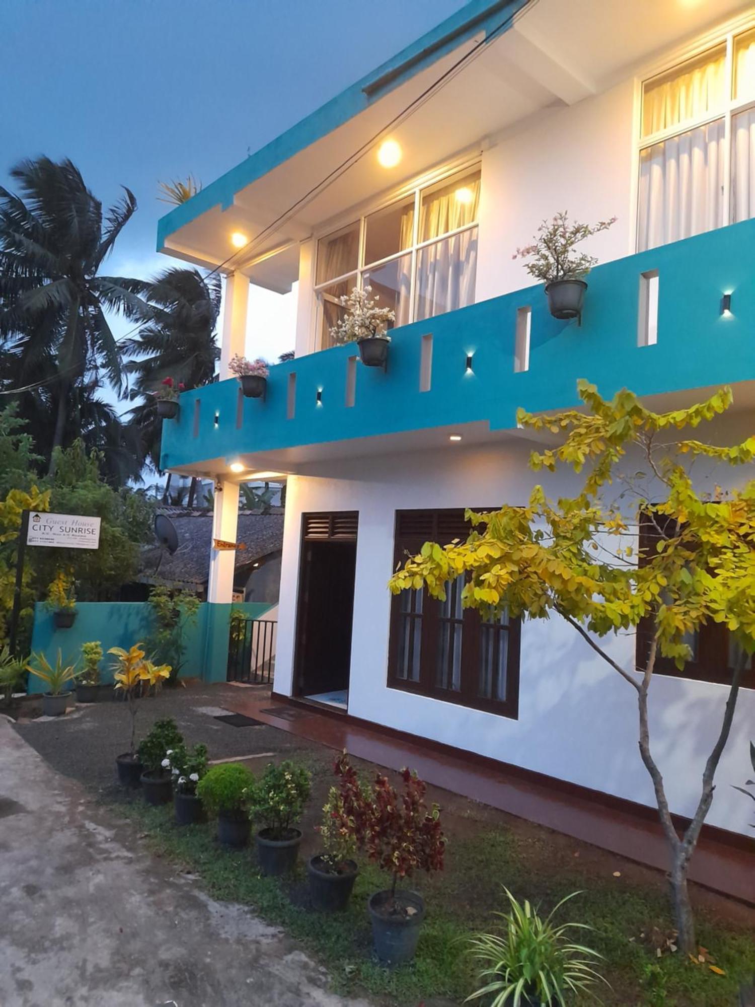 City Sunrise Hikkaduwa Bilik gambar